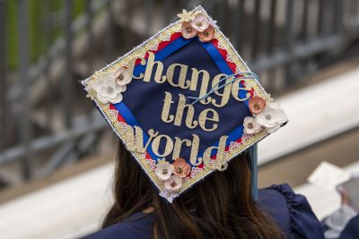 Decorated hat (mortar board) at the 2020 Commencement Ceremony, says "Change the world"