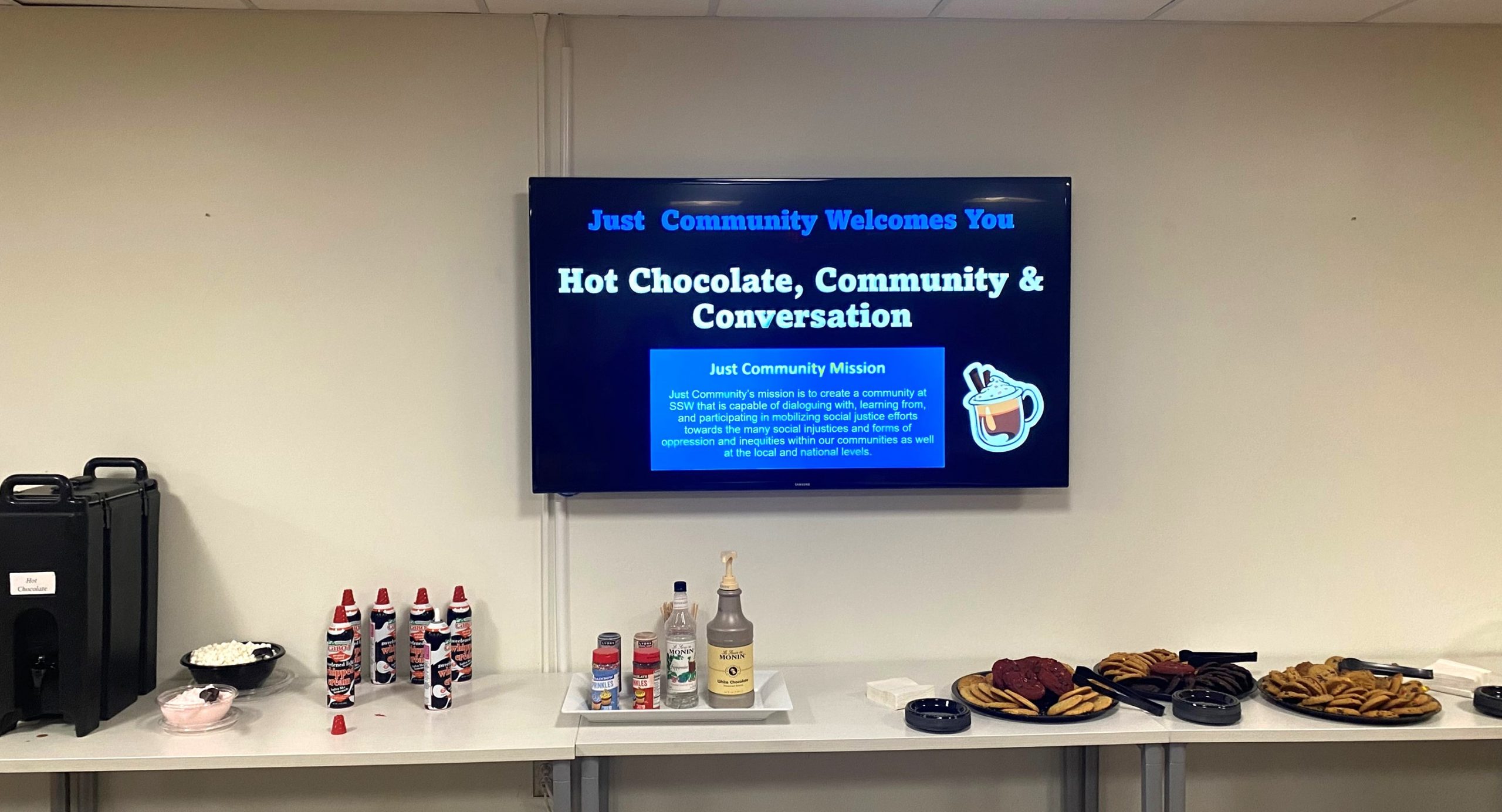 Photo of hot chocolate and snacks in student lounge.