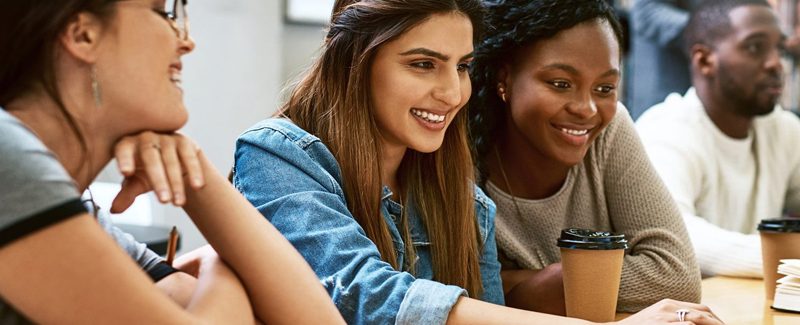 female MSW student smiling in class