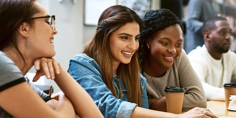 female MSW student smiling in class